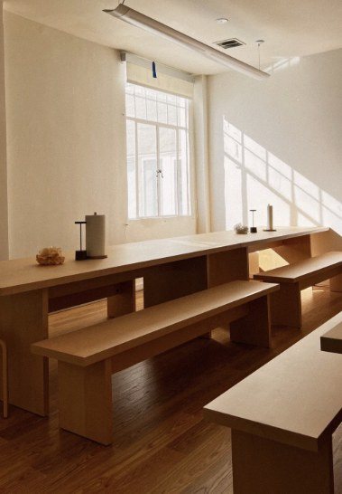 Long wooden tables where the team eats lunch